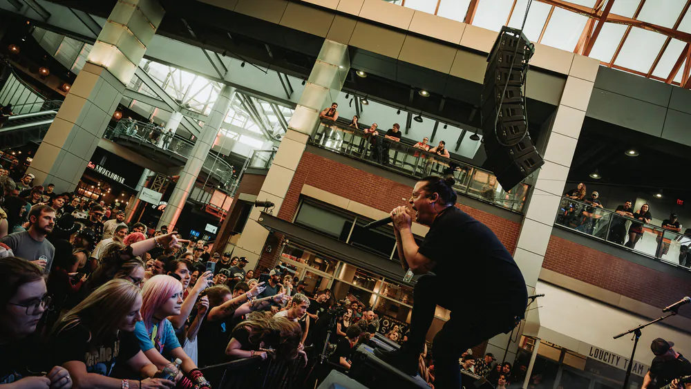 Crowd inside the Fourth Street Live! atrium during a Louisville Loves festival pre-party